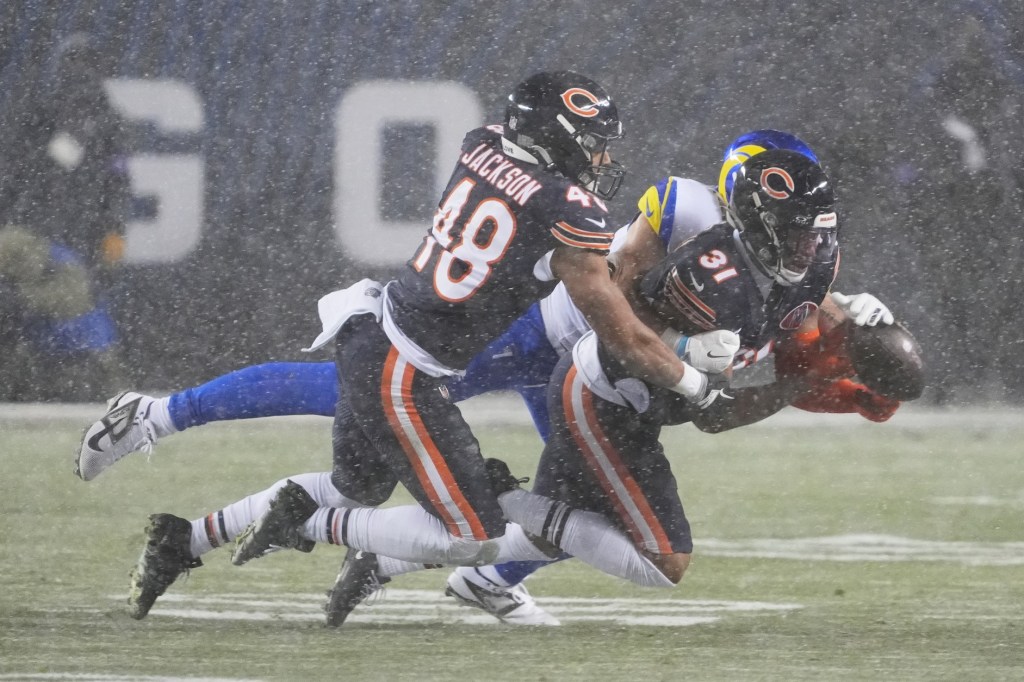 Jan 18, 2026; Chicago, IL, USA; Chicago Bears safety Kevin Byard III (31) breaks up a pass intended for the Los Angeles Rams during the second quarter of an NFC Divisional Round game at Soldier Field.