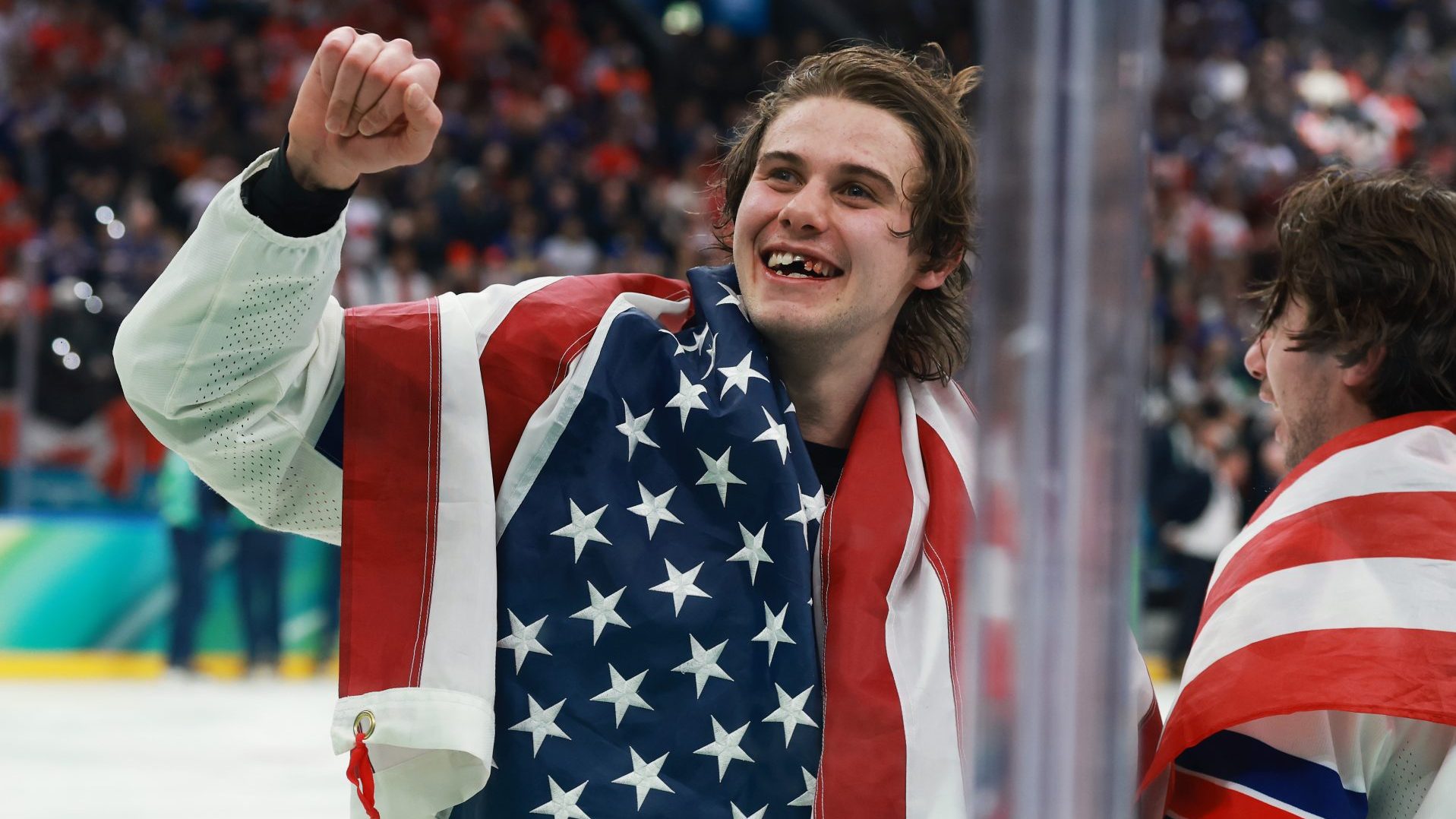 MILAN, ITALY - FEBRUARY 22: Jack Hughes #86 of Team United States celebrates after their gold-medal win during the Men's Gold Medal match between Canada and the United States on day 16 of the Milano Cortina 2026 Winter Olympic games at Milano Santagiulia Ice Hockey Arena on February 22, 2026 in Milan, Italy
