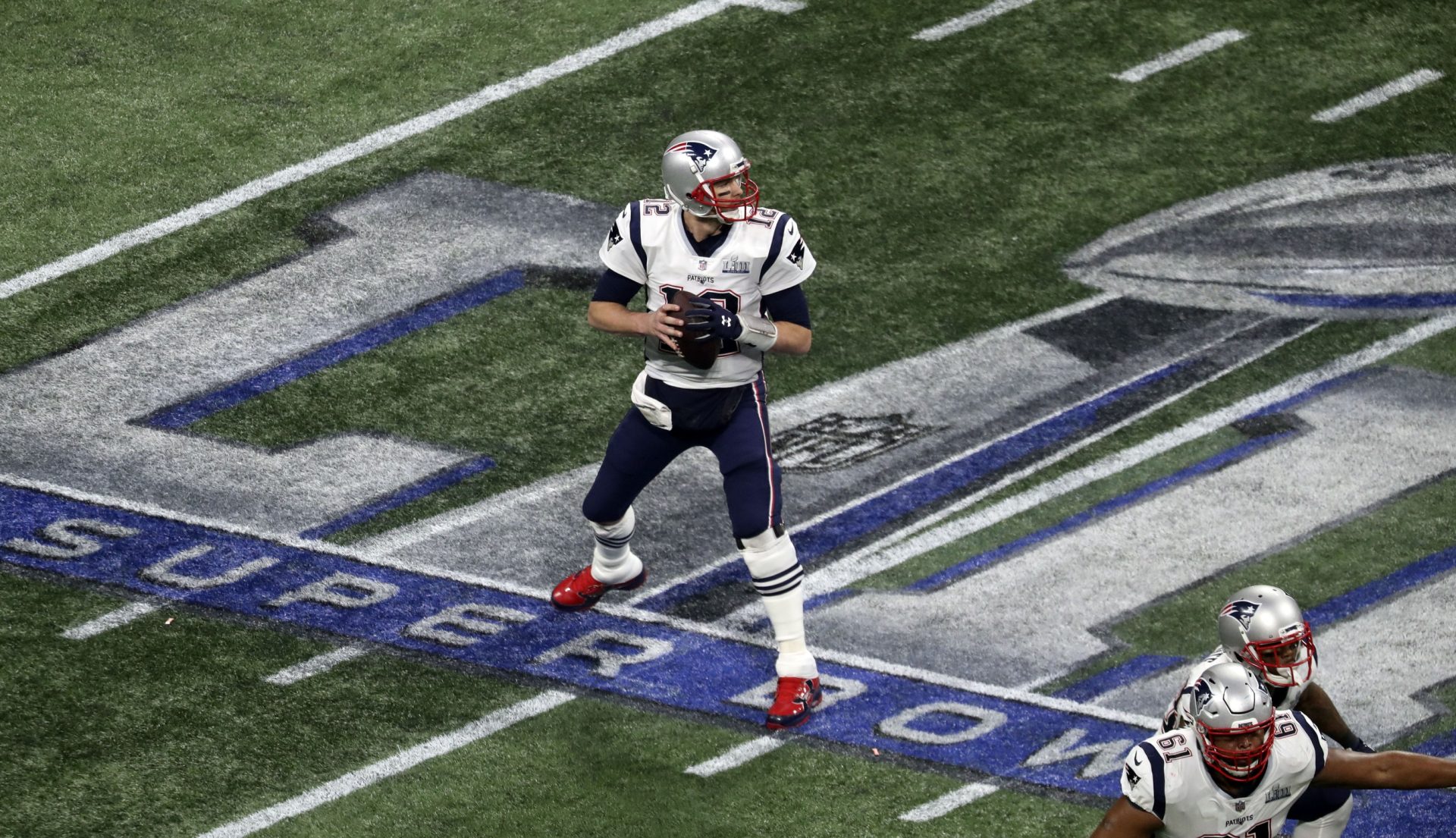 Feb 3, 2019; Atlanta, GA, USA; New England Patriots quarterback Tom Brady (12) throws against the Los Angeles Rams in Super Bowl LIII at Mercedes-Benz Stadium.