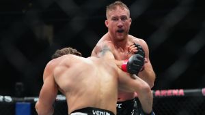 Mar 8, 2025; Las Vegas, Nevada, USA; Justin Gaethje (red gloves) fights Rafael Fiziev (blue gloves) during UFC 313 at T-Mobile Arena. Mandatory Credit: Stephen R. Sylvanie-Imagn Images