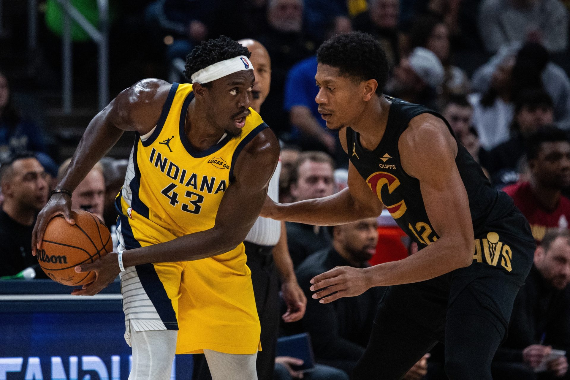 Jan 6, 2026; Indianapolis, Indiana, USA; Indiana Pacers forward Pascal Siakam (43) holds the ball while Cleveland Cavaliers forward/guard De'andre Hunter (12) defends in the first half at Gainbridge Fieldhouse.