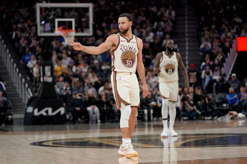 Jan 30, 2026; San Francisco, California, USA; Golden State Warriors guard Stephen Curry (30) reacts after a basket against the Detroit Pistons in the third quarter at the Chase Center.