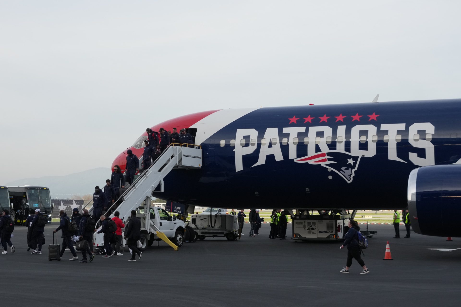 Feb 1, 2026; Santa Clara, CA, USA; New England Patriots players arrive prior to Super Bowl LX at San Jose Mineta International Airport.