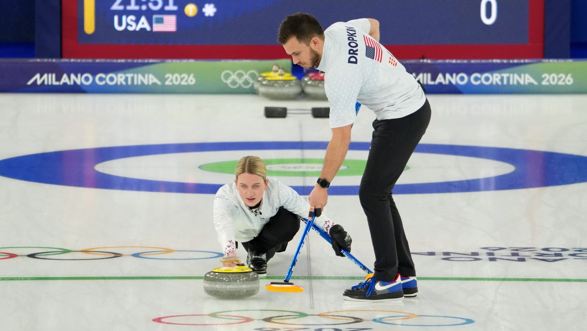 Feb 10, 2026; Cortina d'Ampezzo, Italy; Cory Thiesse and Korey Dropkin of the United States during the curling mixed doubles gold medal game during the Milano Cortina 2026 Olympic Winter Games at Cortina Curling Olympic Stadium