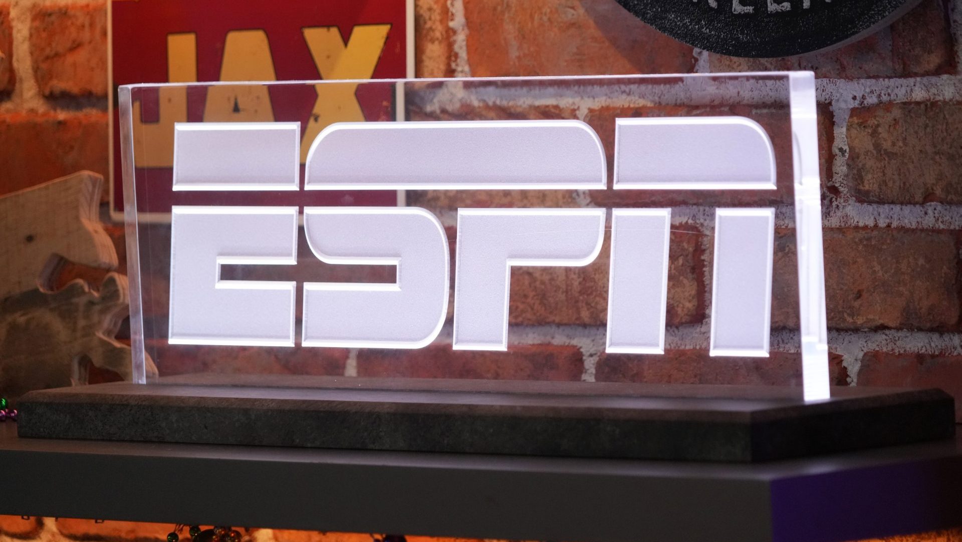 Feb 5, 2025; New Orleans, LA, USA; The ESPN logo at the Super Bowl LIX media center at the Ernest N. Morial Convention Center. Mandatory Credit: Kirby Lee-Imagn Images