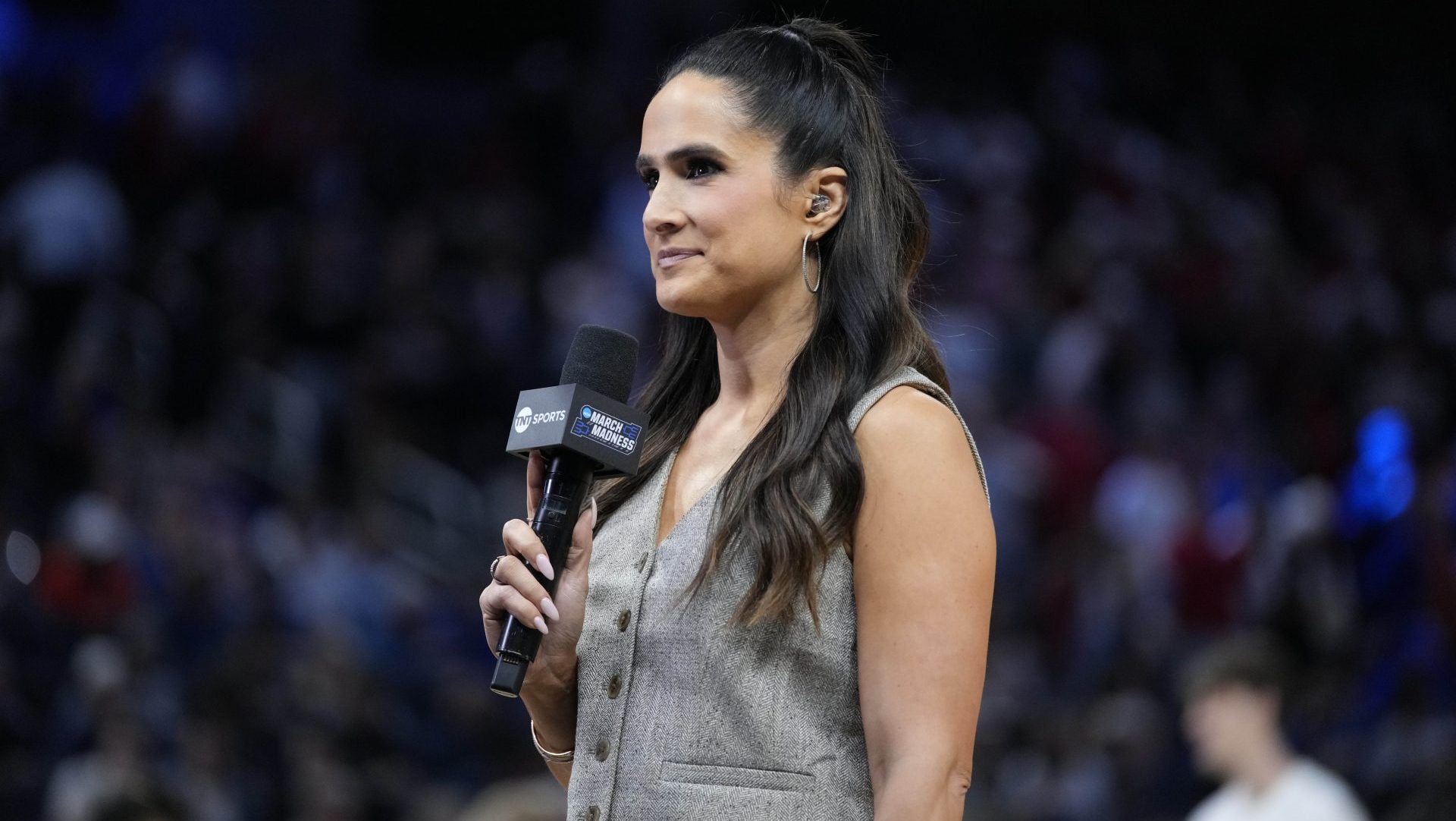 Mar 29, 2025; San Francisco, CA, USA; CBS Sports reporter Lauren Shehadi speaks prior to a game between the Texas Tech Red Raiders and the Florida Gators during the West Regional final of the 2025 NCAA tournament at Chase Center. Mandatory Credit: Kyle Terada-Imagn Images