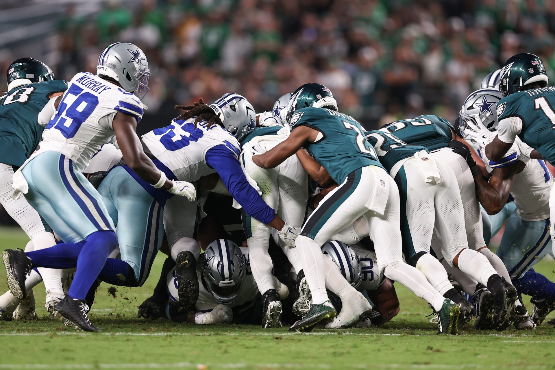 Sep 4, 2025; Philadelphia, Pennsylvania, USA; The Philadelphia Eagles execute a tush push for a first down against the Dallas Cowboys during the fourth quarter of the game at Lincoln Financial Field.