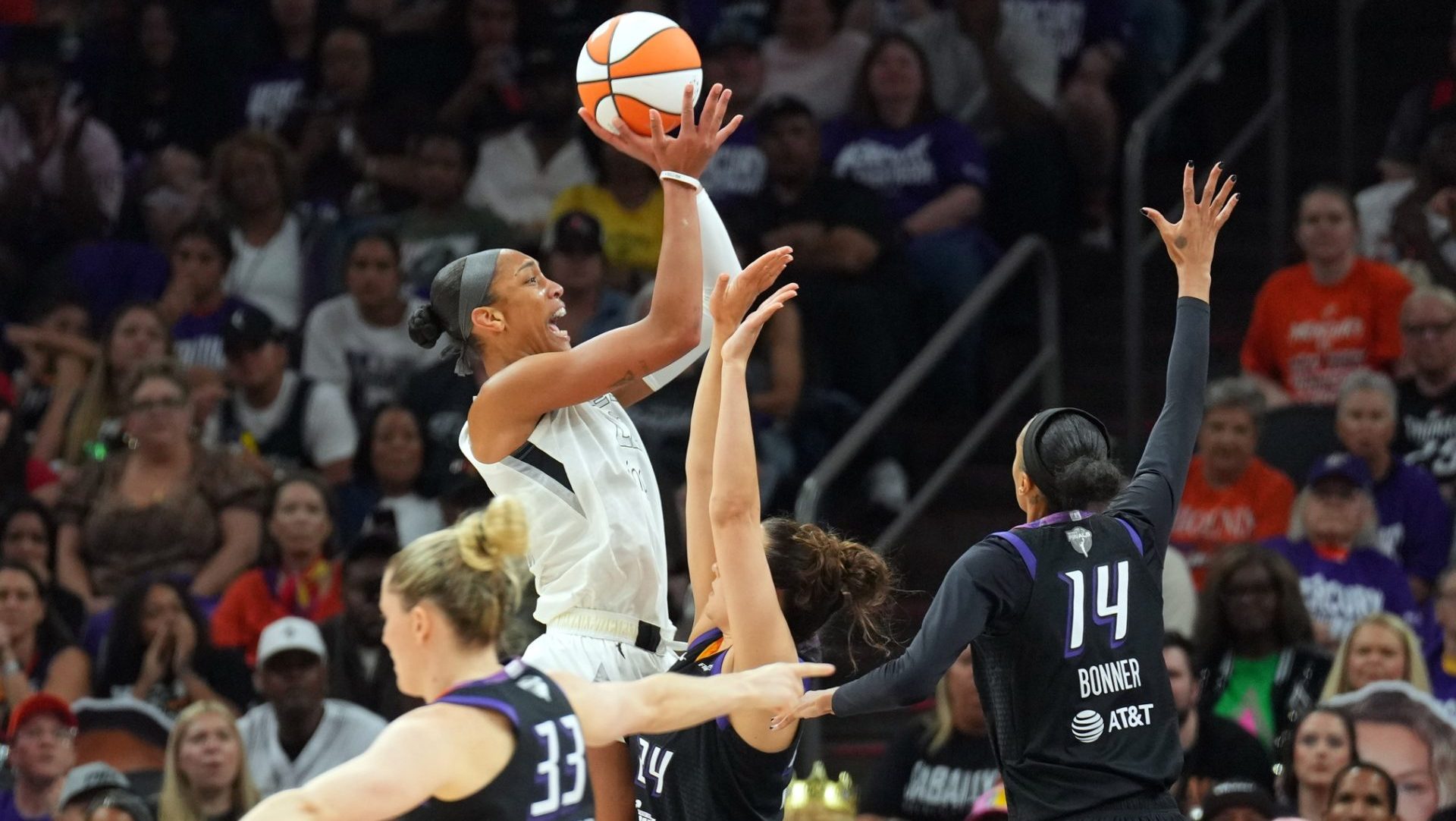 Oct 10, 2025; Phoenix, Arizona, USA; Las Vegas Aces center A'ja Wilson (22) shoots against the Phoenix Mercury during the second half of game four of the 2025 WNBA Finals at Mortgage Matchup Center. Mandatory Credit: Joe Camporeale-Imagn Images