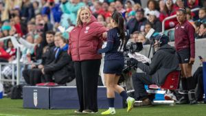 Oct 29, 2025; Kansas City, Missouri, USA; USA Head Coach Emma Hayes speaks with midfielder Lo’eau Labonta (11) during the second half of the match against New Zealand at CPKC Stadium.