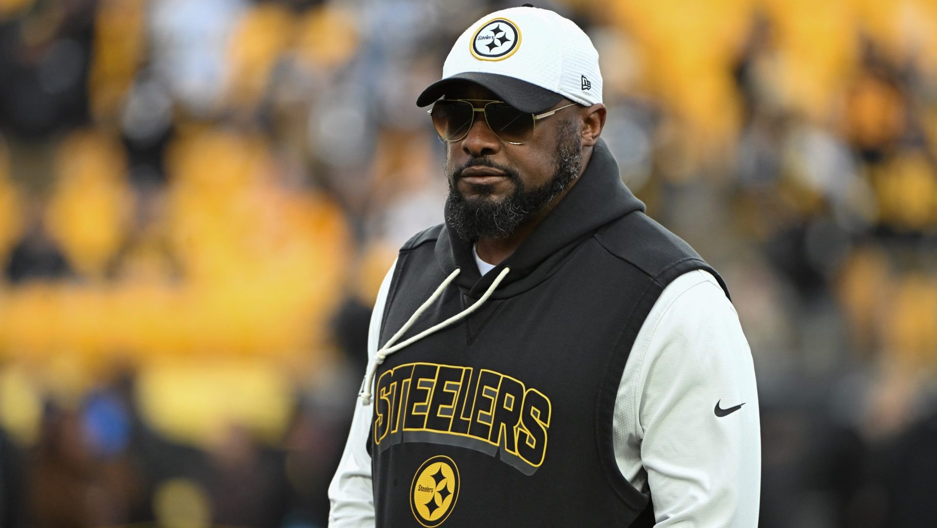 Nov 30, 2025; Pittsburgh, Pennsylvania, USA; Pittsburgh Steelers head coach Mike Tomlin warms up for a game against the Buffalo Bills at Acrisure Stadium. Mandatory Credit: Barry Reeger-Imagn Images