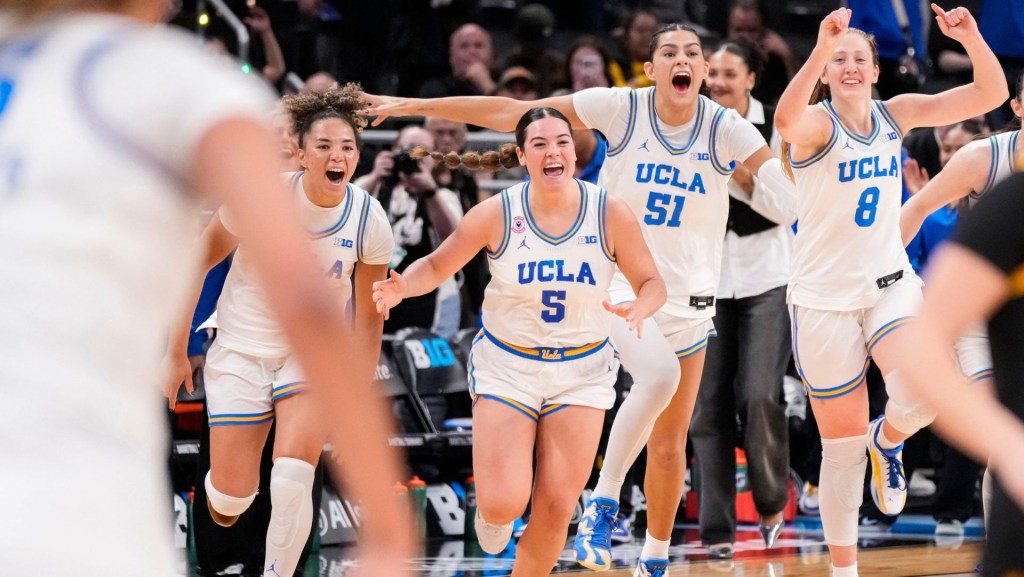 UCLA Bruins celebrates Sunday, March 8, 2026, after the Big Ten Tournament Championship game at Gainbridge Fieldhouse in Indianapolis. UCLA Bruins defeated the Iowa Hawkeyes, 96-45, for back to back Big Ten championships.