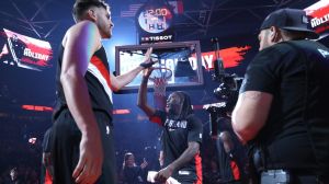Mar 13, 2026; Portland, Oregon, USA; Portland Trail Blazers center Donovan Clingan (23) high-fives guard Jrue Holiday (5) while entering the line up to play against the Utah Jazz at Moda Center.