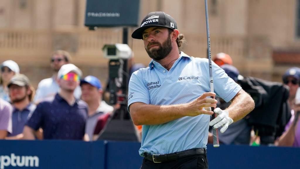 Mar 15, 2026; Ponte Vedra Beach, Florida, USA; Cameron Young watches his tee shot on the first hole during the final round of THE PLAYERS Championship golf tournament.