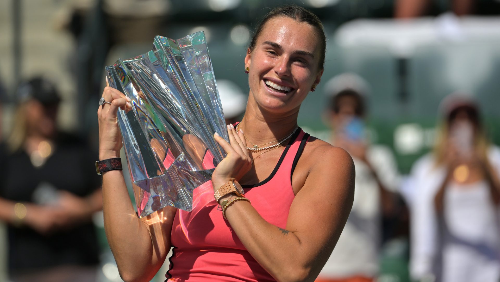 Mar 15, 2026; Indian Wells, CA, USA; Aryna Sabalenka (BEL) celebrates with the championship trophy after winning the women’s final of the BNP Paribas Open defeating Elena Rybakina (KAZ) at the Indian Wells Tennis Garden.