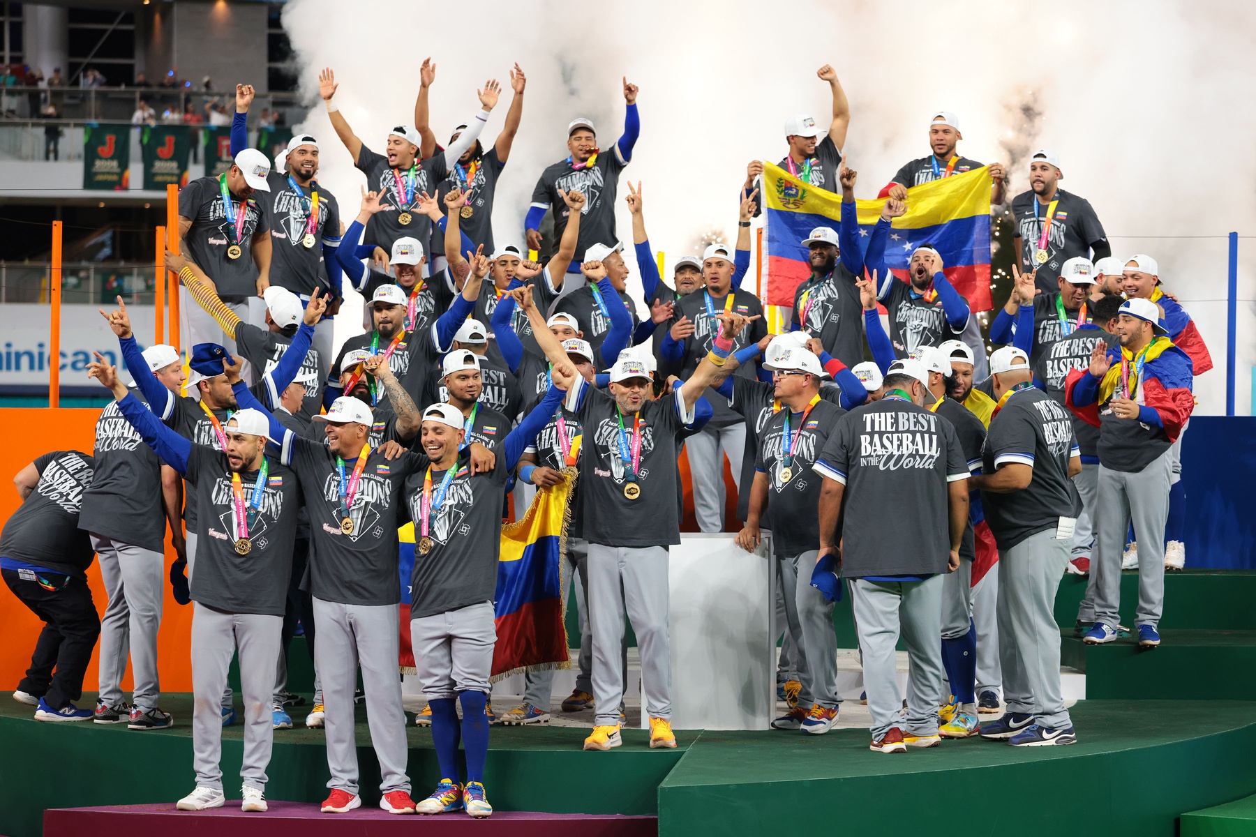Mar 17, 2026; Miami, FL, United States; Venezuela reacts on the stage after defeating the United States during the 2026 World Baseball Classic Championship game at loanDepot Park.