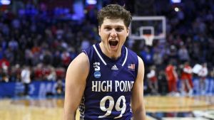 Mar 19, 2026; Portland, OR, USA; High Point Panthers guard Chase Johnston (99) reacts after defeating the Wisconsin Badgers in a first round game of the men's 2026 NCAA Tournament at Moda Center