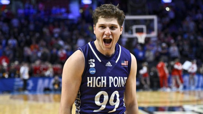 Mar 19, 2026; Portland, OR, USA; High Point Panthers guard Chase Johnston (99) reacts after defeating the Wisconsin Badgers in a first round game of the men's 2026 NCAA Tournament at Moda Center