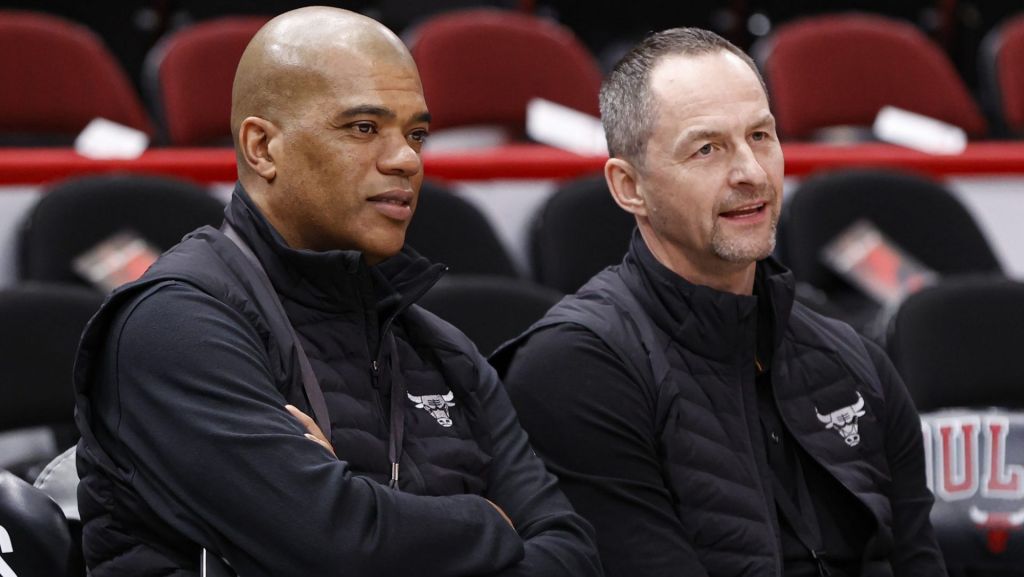 Apr 22, 2022; Chicago, Illinois, USA; Chicago Bulls executive vice president of basketball operations Arturas Karnisovas (right) talks with general manager Marc Eversley (left) before game three of the first round for the 2022 NBA playoffs against the Milwaukee Bucks at United Center. Mandatory Credit: Kamil Krzaczynski-USA TODAY Sports