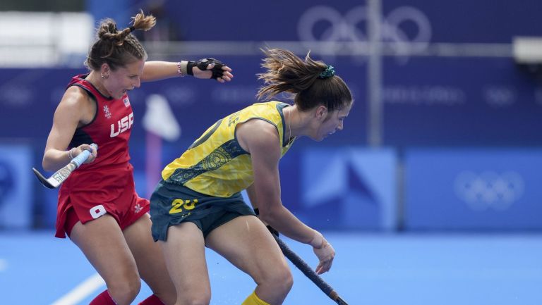 Jul 31, 2024; Colombes, France; United States defender Madeleine Zimmer (9) and Australia defender Karri Somerville (20) during the Paris 2024 Olympic Summer Games at Stade Yves-du-Manoir.