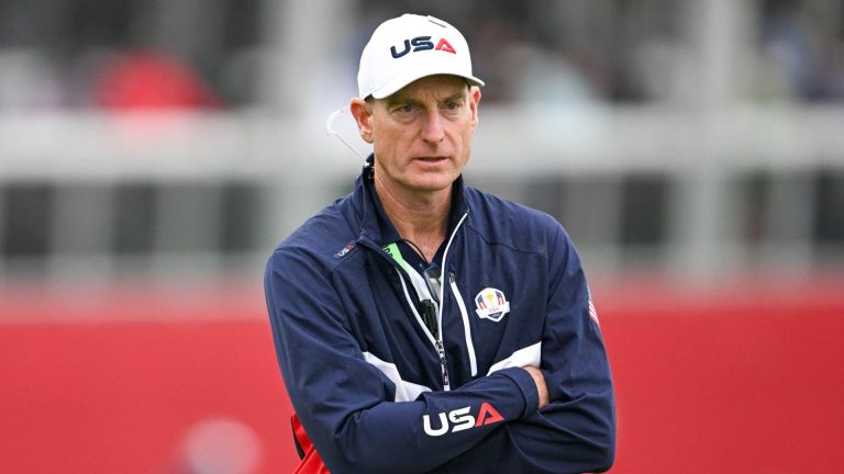 Sep 25, 2025; Bethpage, New York, USA; Jim Furyk coaches on the eighteenth green during a practice round of the Ryder Cup golf tournament at Bethpage Black