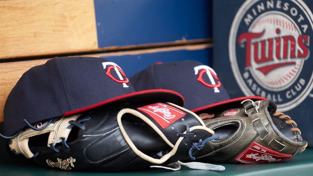Apr 13, 2017; Detroit, MI, USA; Minnesota Twins hat and glove in the dugout during the game against the Minnesota Twins at Comerica Park. Mandatory Credit: Rick Osentoski-USA TODAY Sports