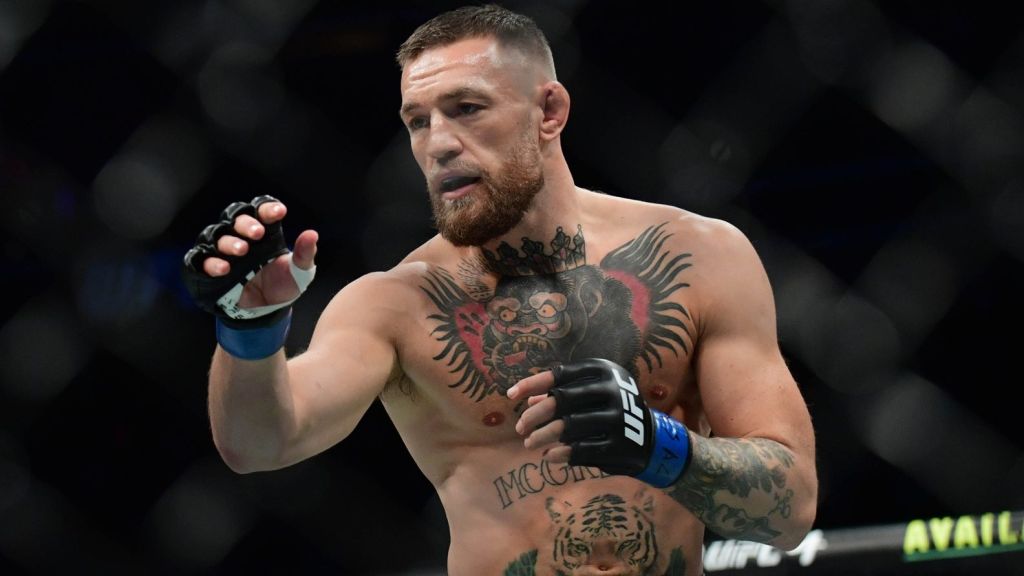 Jul 10, 2021; Las Vegas, Nevada, USA; Conor McGregor fights Dustin Poirier during UFC 264 at T-Mobile Arena. Mandatory Credit: Gary A. Vasquez-USA TODAY Sports