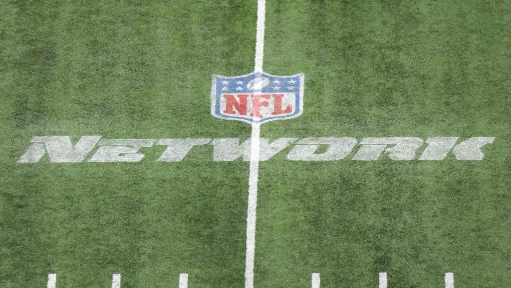 Mar 4, 2023; Indianapolis, IN, USA; The NFL Network logo on the field at Lucas Oil Stadium. Mandatory Credit: Kirby Lee-USA TODAY Sports