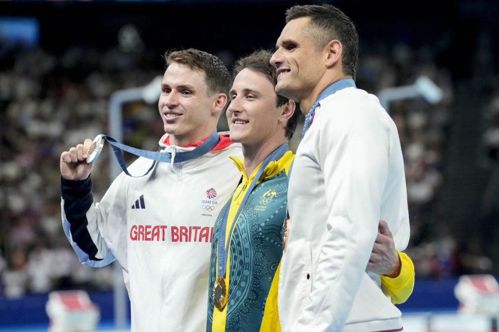 Aug 2, 2024; Nanterre, France; Benjamin Proud (Great Britain), Cameron McEvoy (Australia) and Florent Manaudou (France) in the men’s 50-meter freestyle medal ceremony during the Paris 2024 Olympic Summer Games at Paris La Défense Arena.