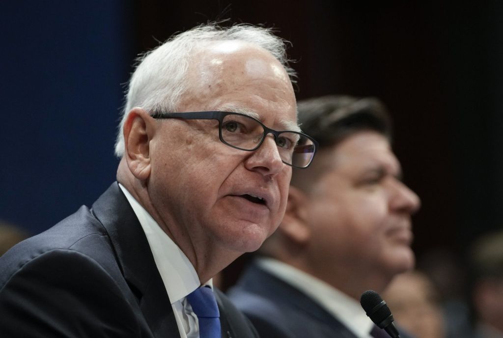 Jun 12, 2025; Washington, DC, USA; Gov. Tim Walz (D-MN), left, alongside Gov. JB Pritzker (D-IL), right, and Gov. Kathy Hochul (D-NY), not shown, testify before the House Committee on Oversight and Government Reform during a hearing on state immigration enforcement policy in Washington, D.C., on June 12, 2025.