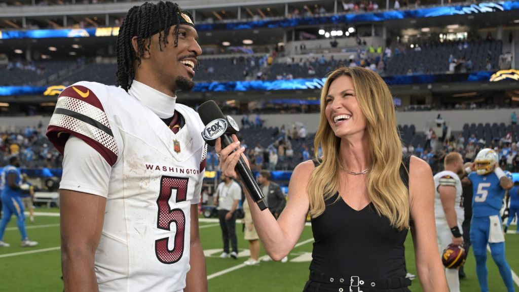Oct 5, 2025; Inglewood, California, USA; FOX sideline reporter Erin Andrews interviews Washington Commanders quarterback Jayden Daniels (5) after the game against the Los Angeles Chargers at SoFi Stadium. Mandatory Credit: Jayne Kamin-Oncea-Imagn Images