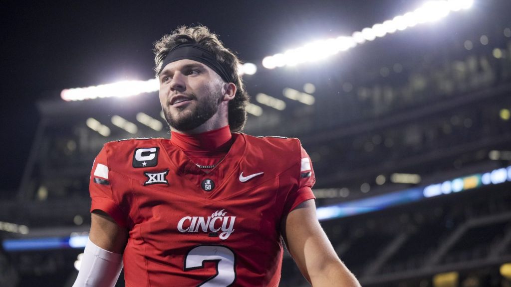 Oct 25, 2025; Cincinnati, Ohio, USA; Cincinnati Bearcats quarterback Brendan Sorsby walks off the field after defeating the Baylor Bears at Nippert Stadium. Mandatory Credit: Aaron Doster-Imagn Images