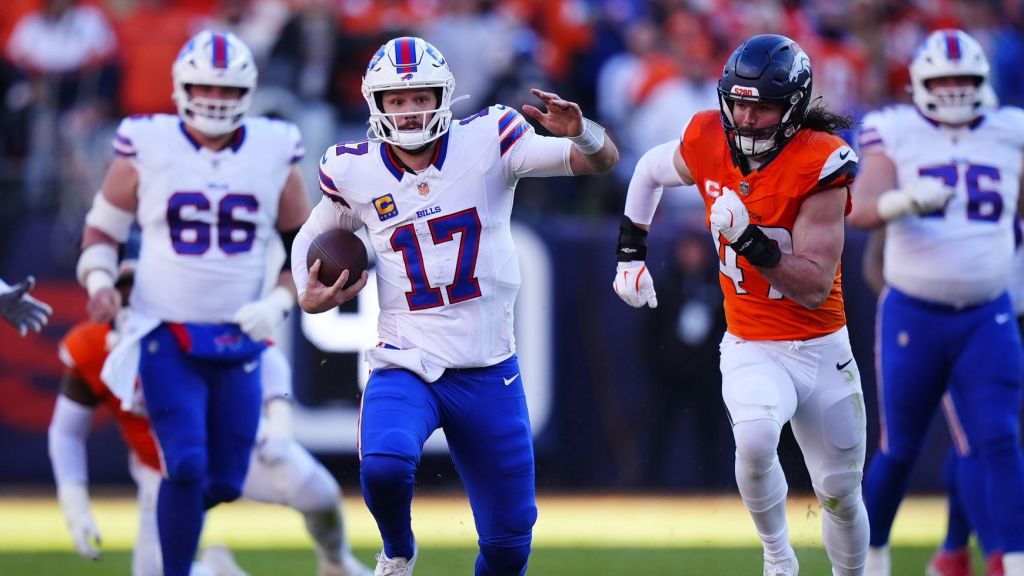 Jan 17, 2026; Denver, CO, USA; Buffalo Bills quarterback Josh Allen (17) runs against Denver Broncos linebacker Karene Reid (47) during the second quarter of an AFC Divisional Round playoff game at Empower Field at Mile High.