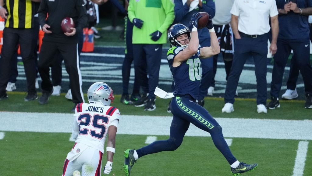 Feb 8, 2026; Santa Clara, CA, USA; Seattle Seahawks wide receiver Cooper Kupp (10) catches a pass against New England Patriots cornerback Marcus Jones (25) in the first half in Super Bowl LX at Levi's Stadium.