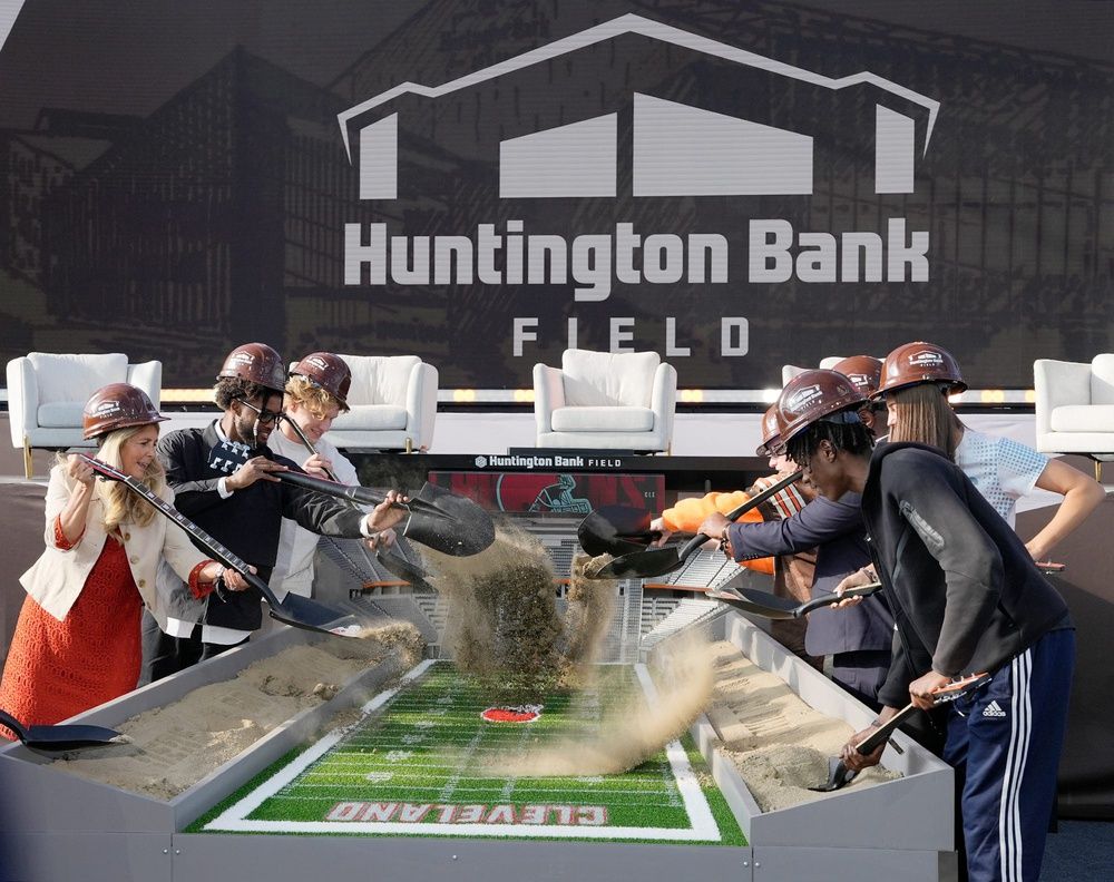 Cleveland Browns players Denzel Ward and Carson Schwesinger, left, join with others as they take part in the ceremonial groundbreaking for the new Huntington Bank Field in Brook Park, Ohio on April 30, 2026.