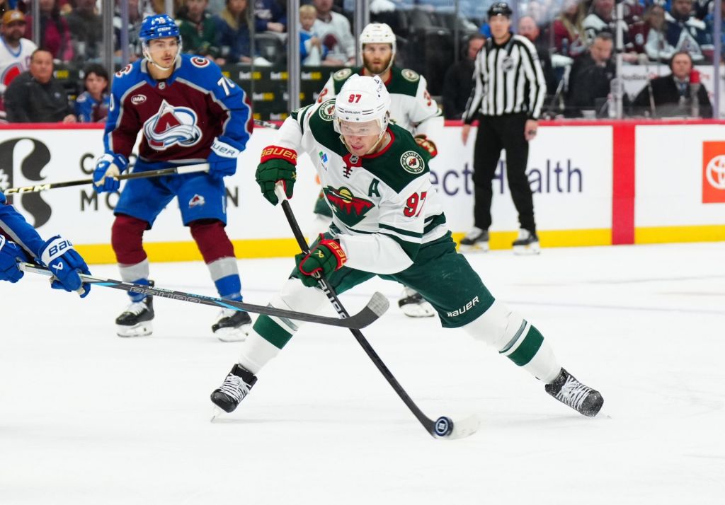 May 3, 2026; Denver, Colorado, USA; Minnesota Wild left wing Kirill Kaprizov (97) prepares to take a shot on goal against the Colorado Avalanche during the first period in game one of the second round of the 2026 Stanley Cup Playoffs at Ball Arena.