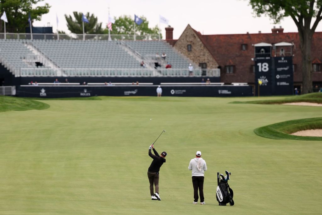May 11, 2026; Newtown Square, Pennsylvania, Mark Geddes plays a shot the eighteenth hole during a practice round of the PGA Championship golf tournament at Aronimink Golf Club.