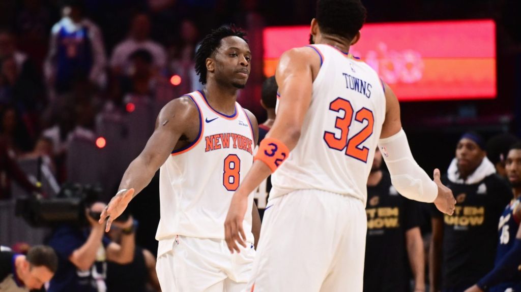 May 25, 2026; Cleveland, Ohio, USA; New York Knicks forward OG Anunoby (8) high fives New York Knicks center Karl-Anthony Towns (32) in the fourth quarter against the Cleveland Cavaliers during game four of the eastern conference finals for the 2026 NBA playoffs at Rocket Arena.