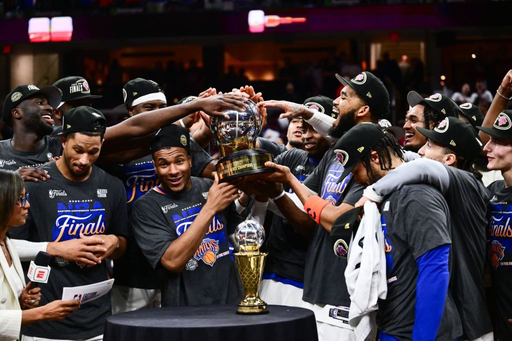May 25, 2026; Cleveland, Ohio, USA; New York Knicks lift the 2026 Eastern Conference trophy after defeating the Cleveland Cavaliers in game four of the eastern conference finals for the 2026 NBA playoffs at Rocket Arena.