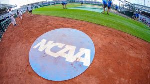 Jun 18, 2023; Omaha, NE, USA; An on-deck circle with the NCAA logo is pictured on the field before the game between the Virginia Cavaliers and the TCU Horned Frogs at Charles Schwab Field Omaha