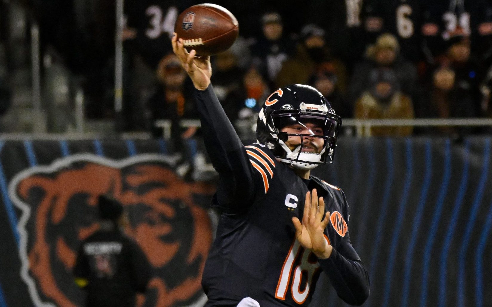 Jan 4, 2026; Chicago, Illinois, USA; Chicago Bears quarterback Caleb Williams (18) passes the ball against the Detroit Lions during the second half at Soldier Field.