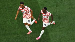 Soccer Football - FIFA World Cup 2026 - Group D - United States v Paraguay - Los Angeles Stadium, Inglewood, California, U.S. - June 12, 2026 Folarin Balogun of the U.S. celebrates scoring their second goal with Alex Freeman