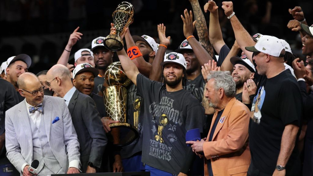 Jun 13, 2026; San Antonio, Texas, USA; New York Knicks guard Jalen Brunson holds the Finals MVP trophy during the championship celebration after game five of the 2026 NBA Finals against the San Antonio Spurs at Frost Bank Center. Mandatory Credit: Geoff Burke-Imagn Images