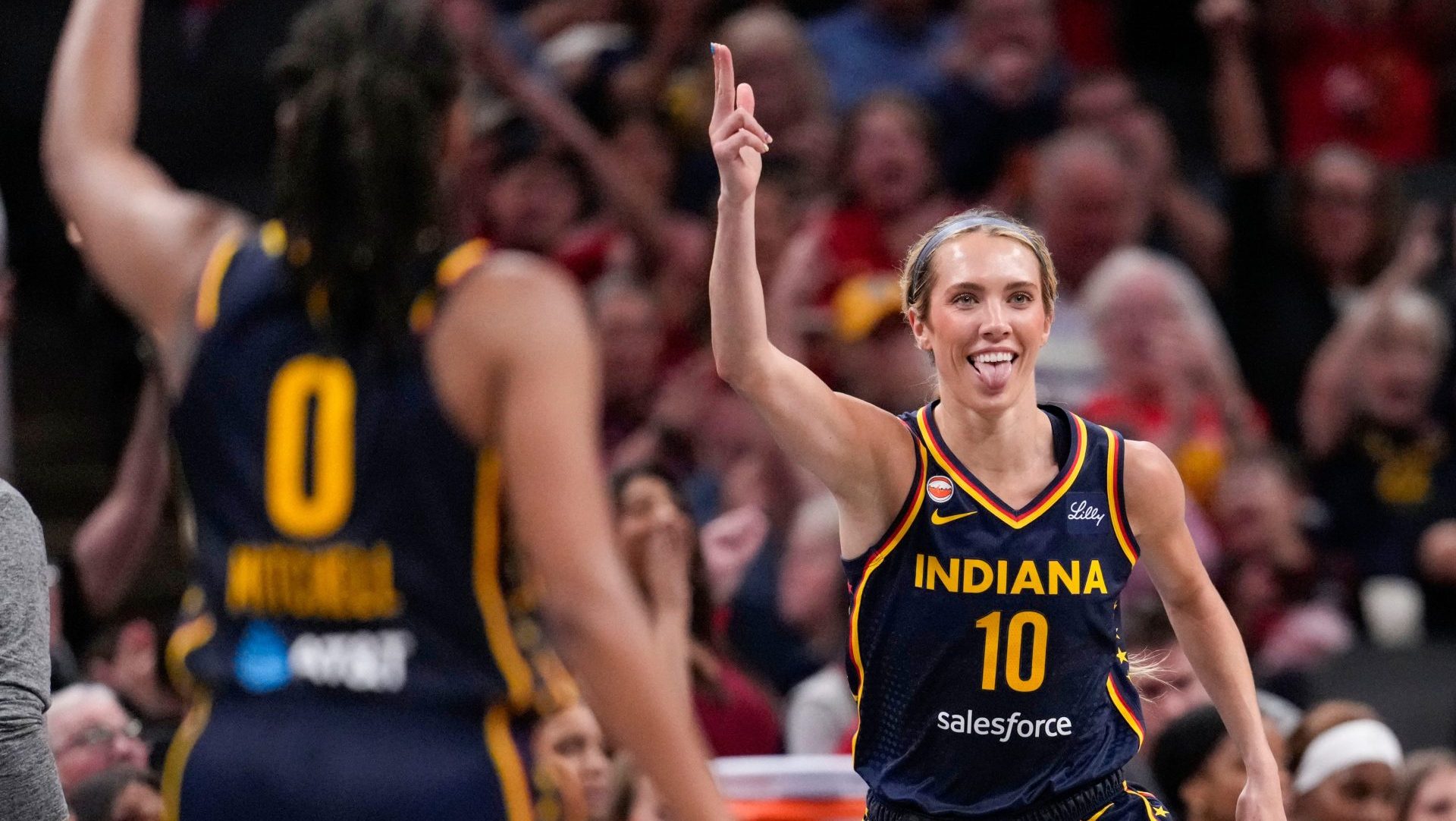 Indiana Fever guard Lexie Hull (10) celebrates a three-point basket Monday, June 22, 2026, during the game at Gainbridge Fieldhouse in Indianapolis. The Indiana Fever defeated the Phoenix Mercury, 86-77