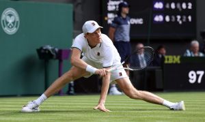 Tennis - Wimbledon - All England Lawn Tennis and Croquet Club, London, Britain - June 29, 2026 Italy's Jannik Sinner in action during his first round match against Serbia's Miomir Kecmanovic