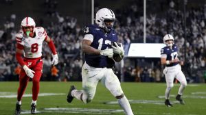 Nov 22, 2025; University Park, Pennsylvania, USA; Penn State Nittany Lions running back Kaytron Allen (13) runs the ball into the end zone for a touchdown during the fourth quarter against the Nebraska Cornhuskers at Beaver Stadium.