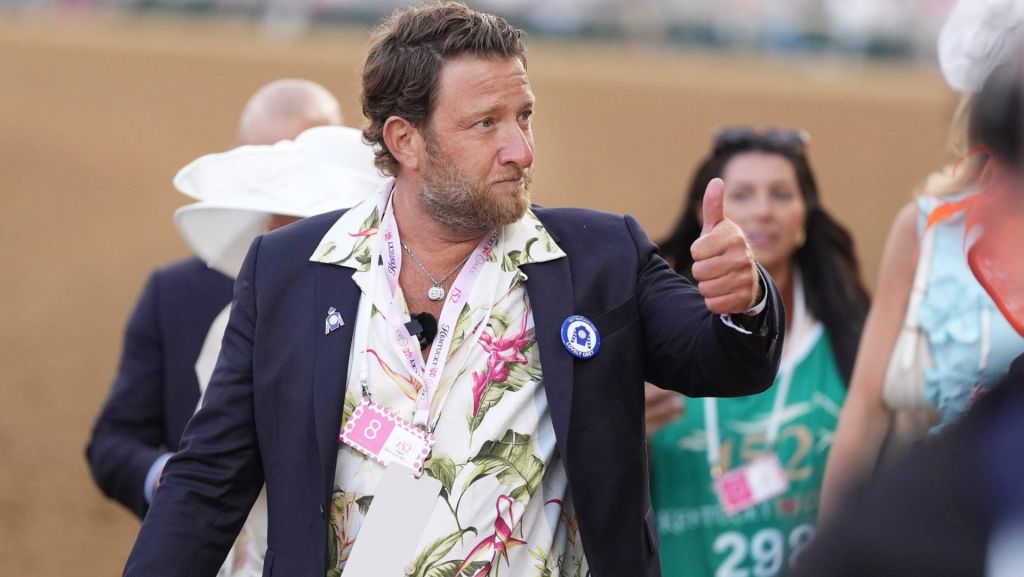 May 1, 2026; Louisville, KY, USA; Dave Portnoy walks and gives a thumbs up to his fans during the 152nd running of the Kentucky Oaks at Churchill Downs. Mandatory Credit: Scott Utterback/USA TODAY NETWORK via Imagn Images