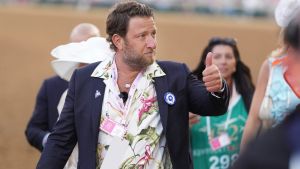 May 1, 2026; Louisville, KY, USA; Dave Portnoy walks and gives a thumbs up to his fans during the 152nd running of the Kentucky Oaks at Churchill Downs. Mandatory Credit: Scott Utterback/USA TODAY NETWORK via Imagn Images