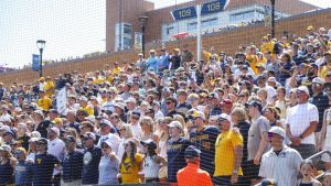 Jun 5, 2026; Morgantown, WV, USA; West Virginia Mountaineers fans sing “Country Roads” after defeating the Cal Poly Mustangs at Kendrick Family Ballpark. Mandatory Credit: Ben Queen-Imagn Images