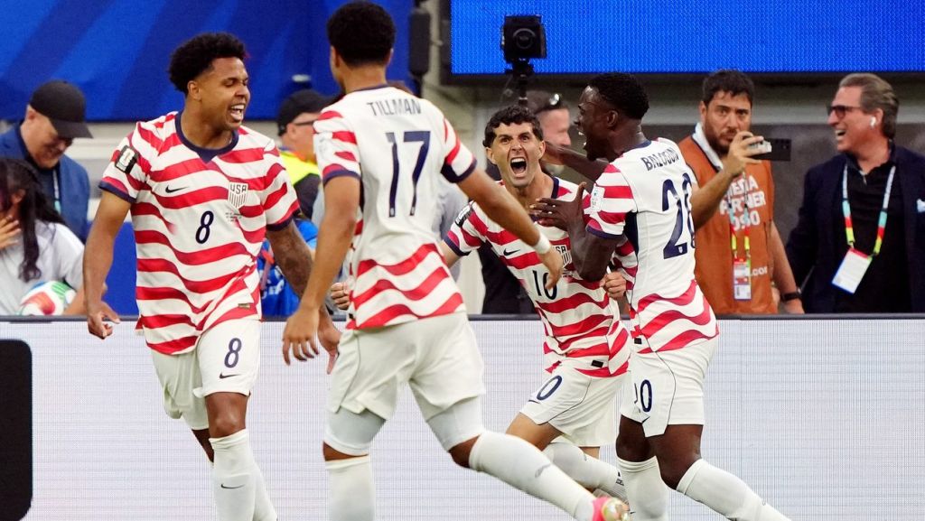 June 12, 2026; Inglewood, California, U.S.; Christian Pulisic, Weston McKennie, Folarin Balogun and Malik Tillman of the U.S. celebrate their first goal, an own goal scored by Paraguay's Damian Bobadilla. Mandatory Credit: Kirby Lee-Imagn Images