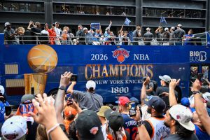 Jun 18, 2026; New York, NY, USA; A New York Knicks Champions bus passes during the New York Knicks Championship Parade through the Canyon of Heroes.